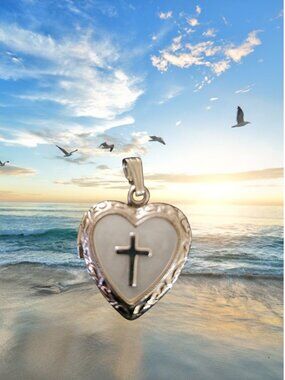 An elegant 925 sterling silver heart shaped locket